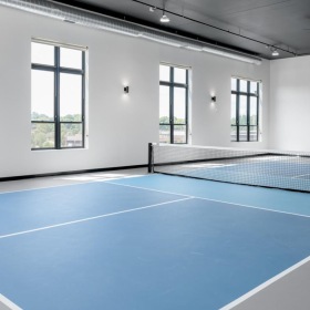 an indoor tennis room