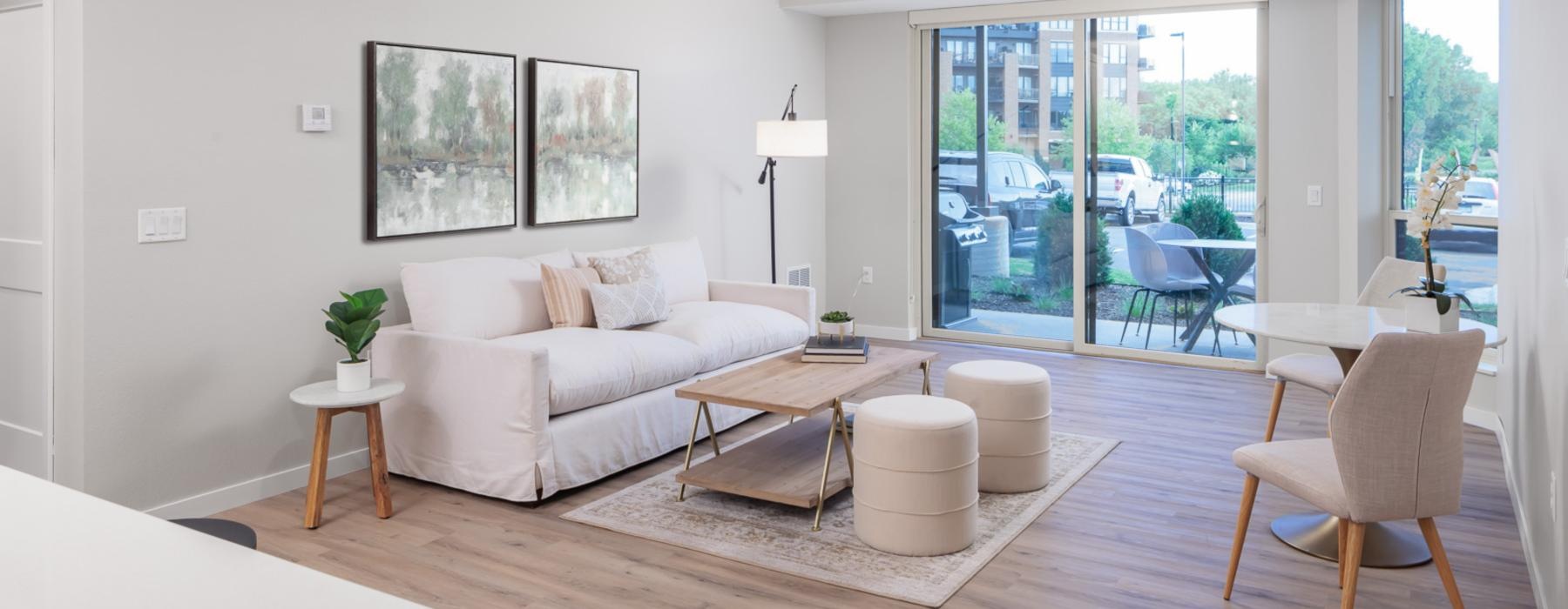 a living room with a large glass door